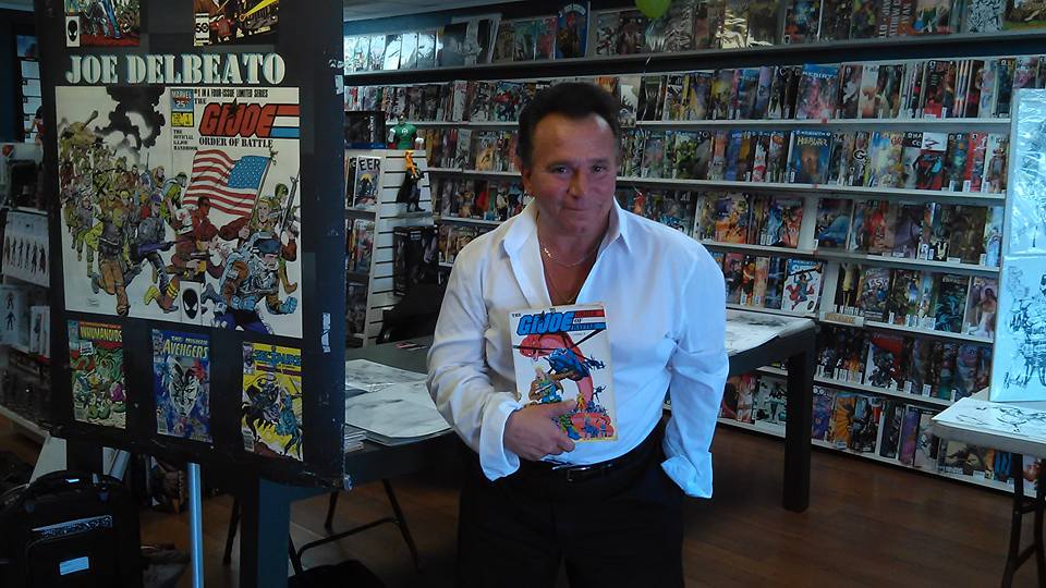 man holding comic book