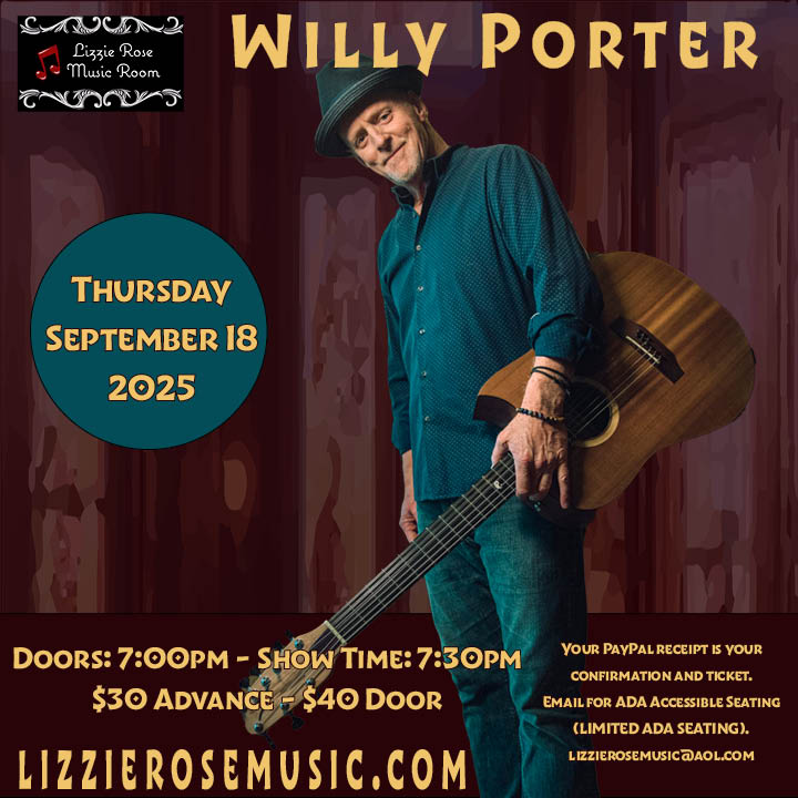 Willy Porter holding guitar