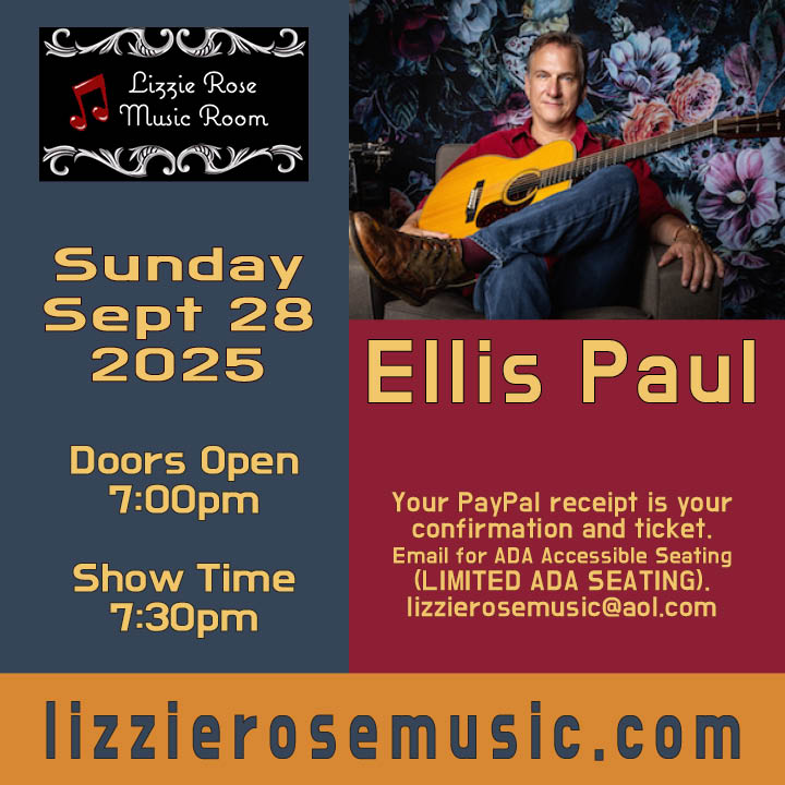 Ellis Paul holding Guitar