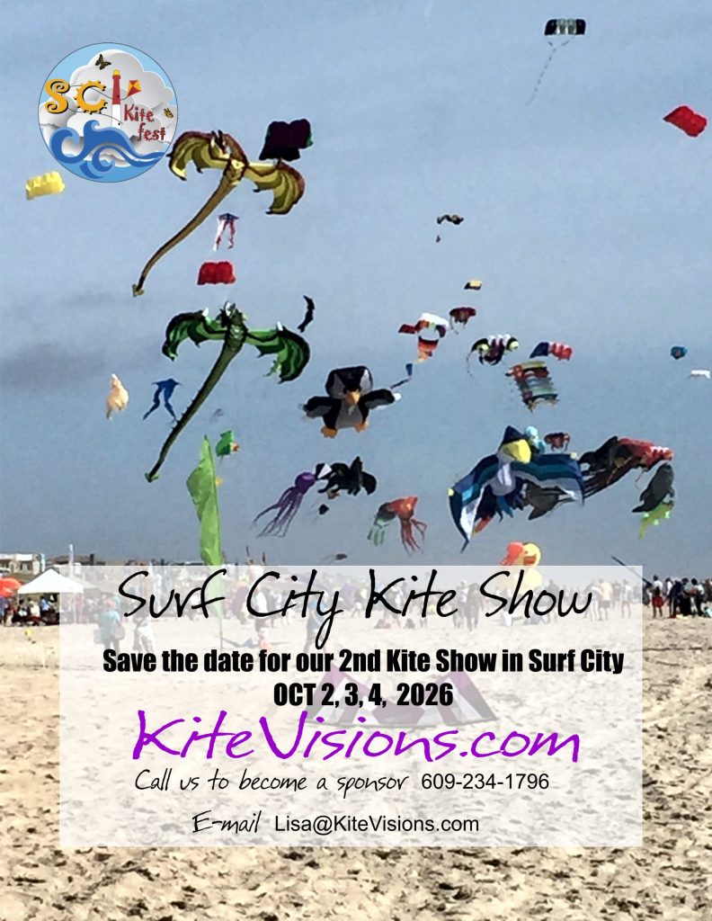 People flying kites on the beach 