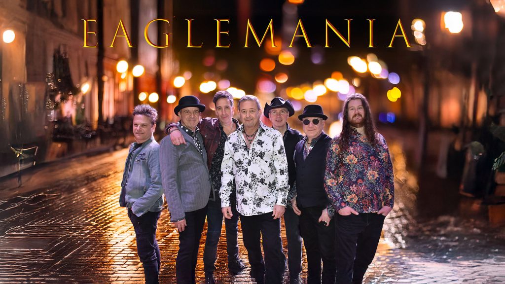 group of people standing in street