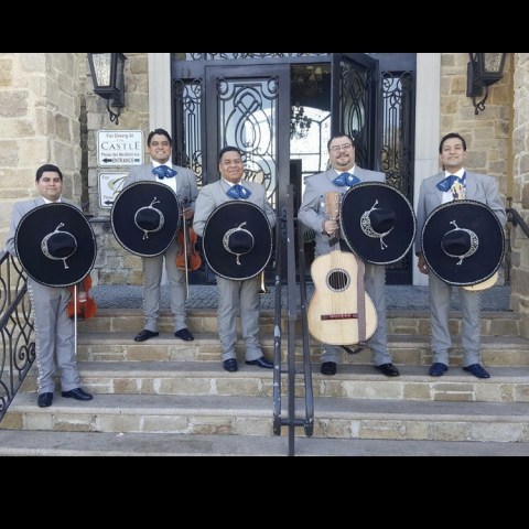 Mariachi Band standing on steps