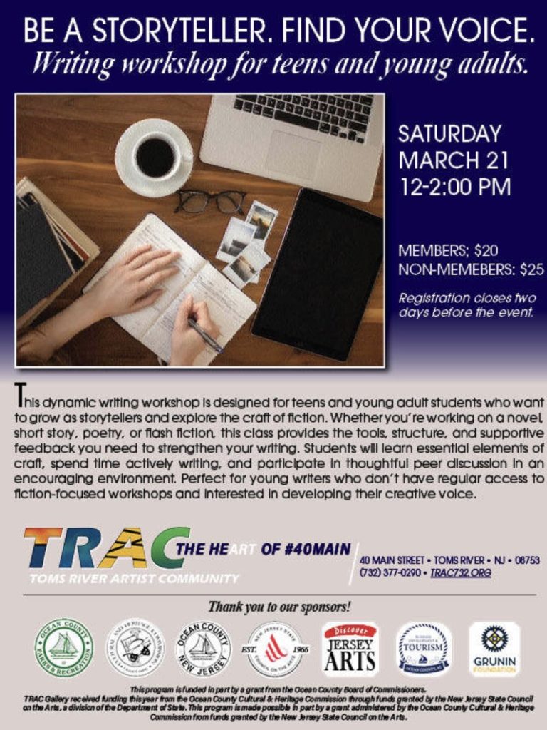 person writing in notebook on a table with a laptop and coffee