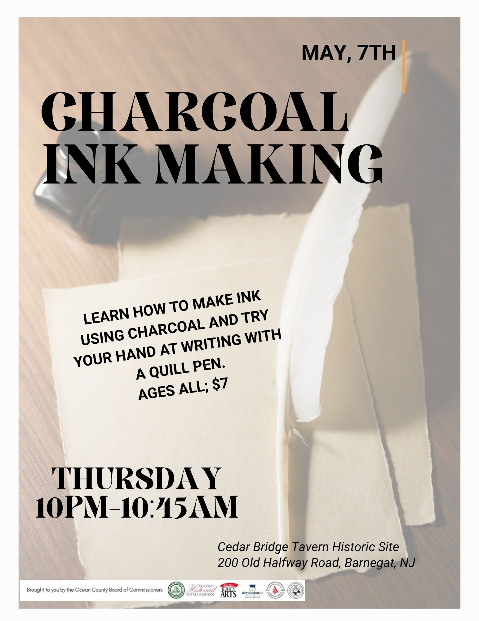 feather pen on paper