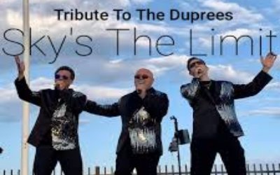 Three people singing with clouds and sky in the background