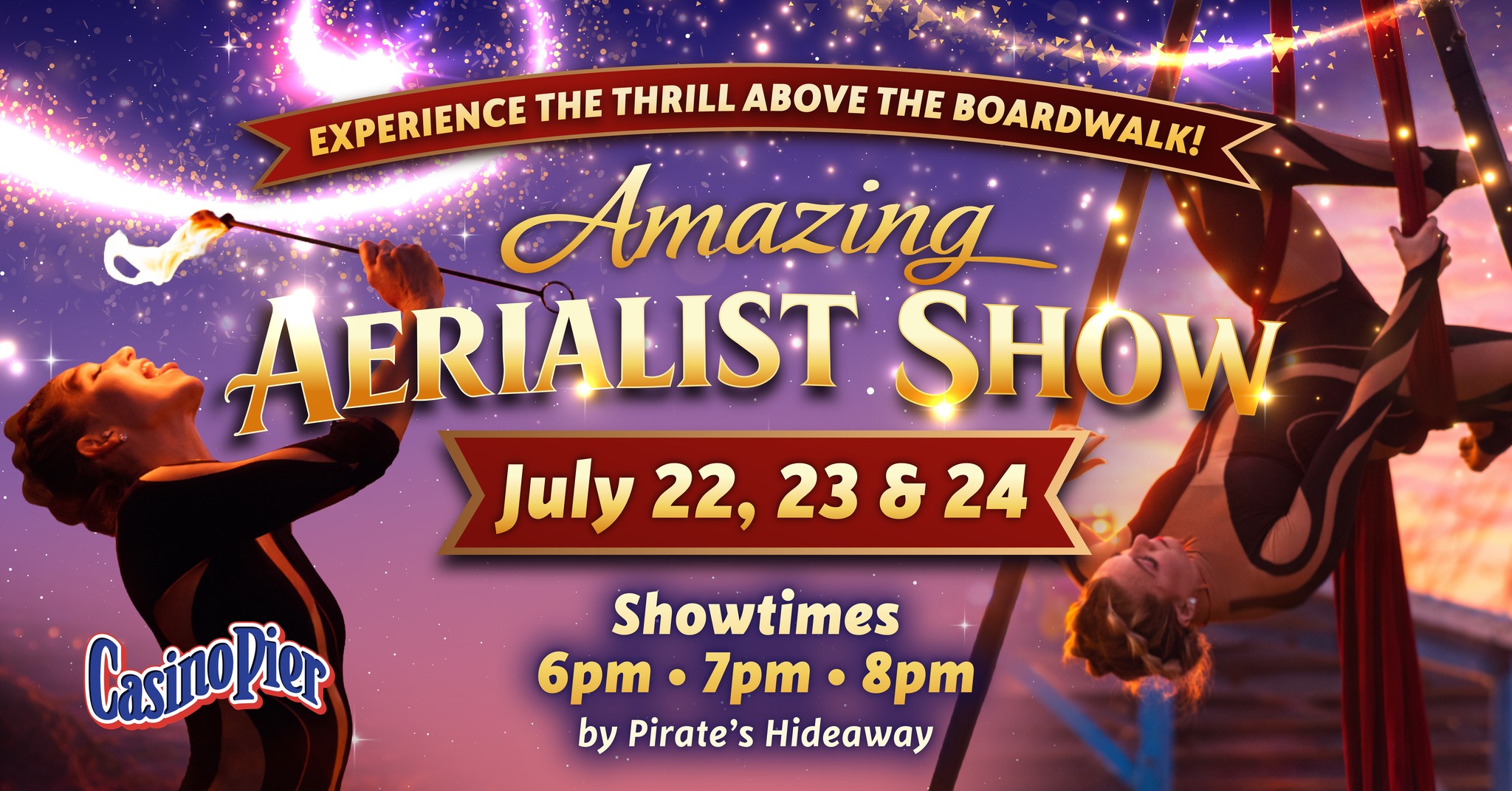 Aerialists holding a fire stick and doing acrobatics