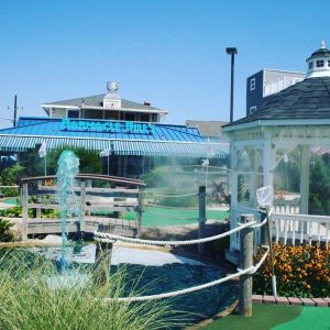 mini golf course with a gazebo and a fountain