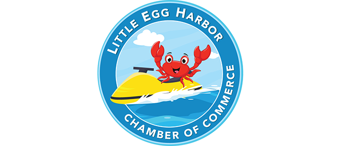 Little Egg Harbor Chamber of Commerce logo with a crab riding on a jet ski in the ocean