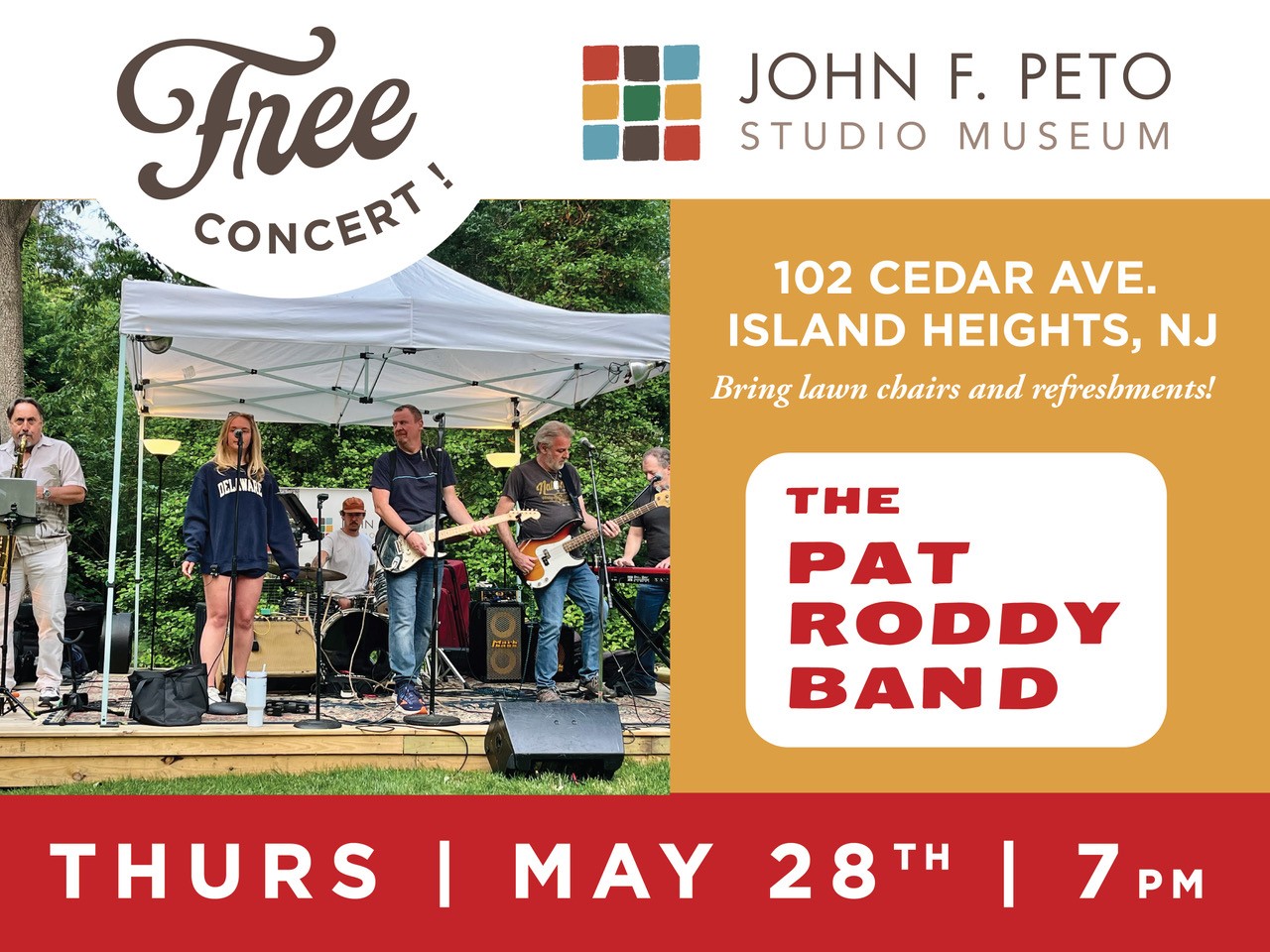 Pat Roddy Band playing on a stage under a white tent