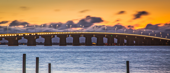 a view of a bridge during a sunset