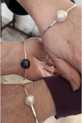 Sterling Silver bangles on a wrist