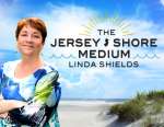 Linda Shields, The Jersey Shore Medium. Standing with her arms crossed with a beach background