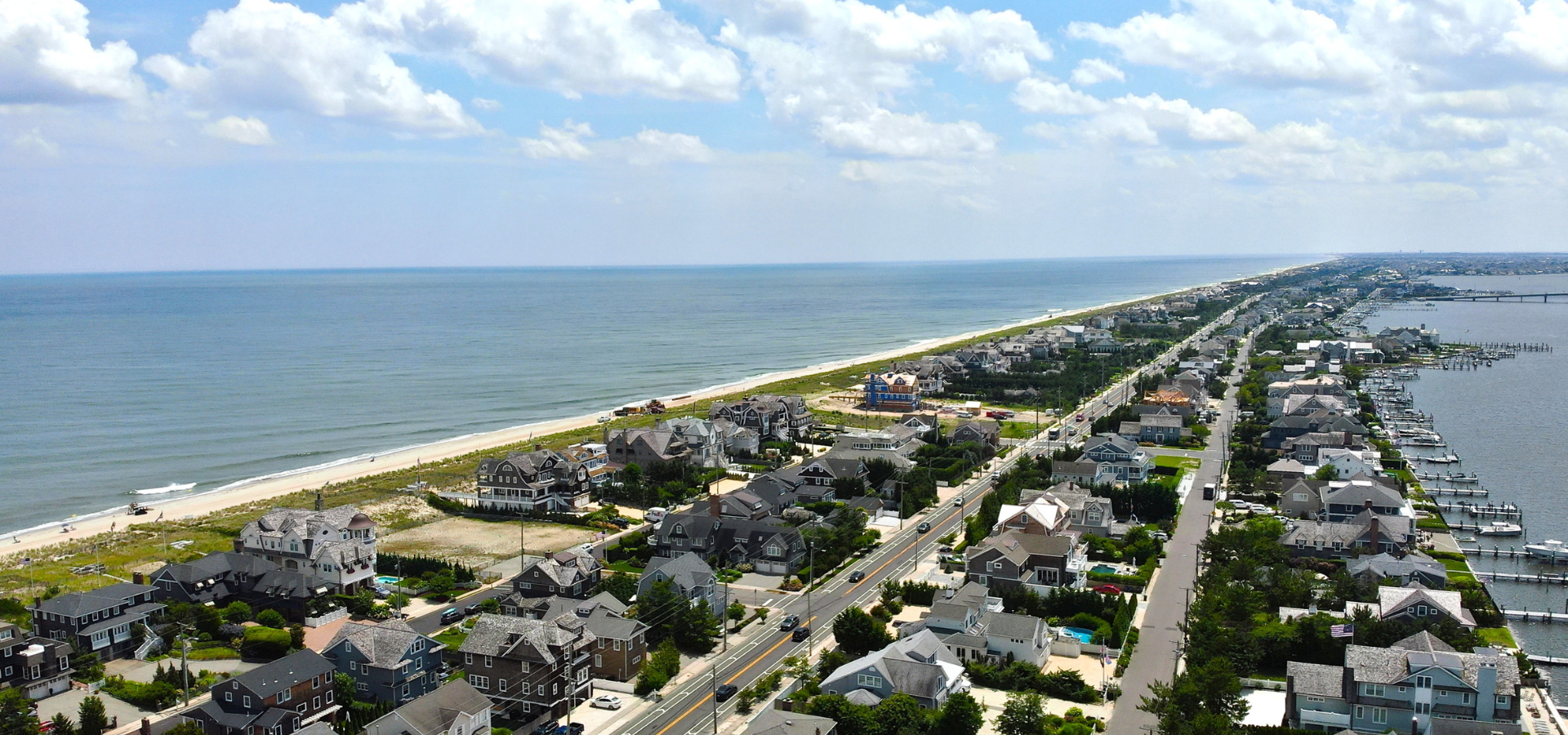 aerial view of homes and the ocean