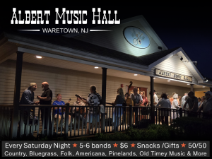 People playing music on a front porch of Albert Music Hall