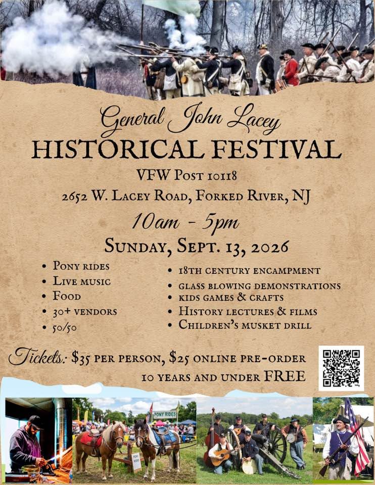 war reenactment, two ponies in western saddles, a band posing for a photo by a wagon wheel and a man cooking
