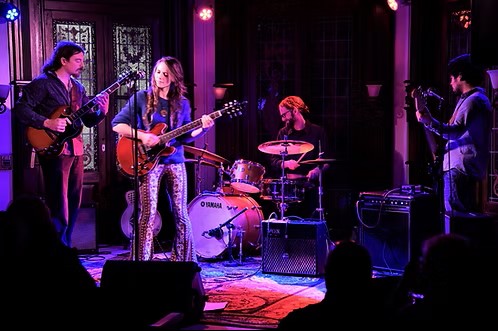band playing music on a stage