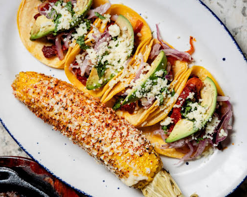 picture of tacos and corn on a plate