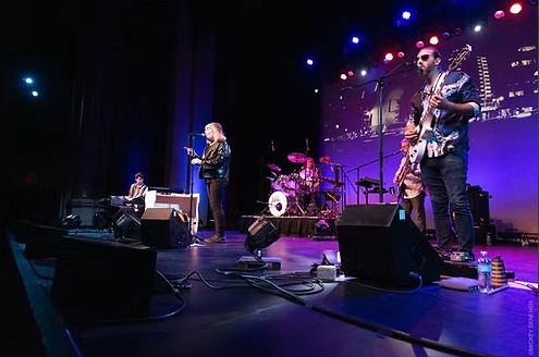 band playing music on a stage