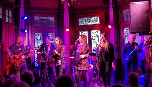 band playing music on a stage