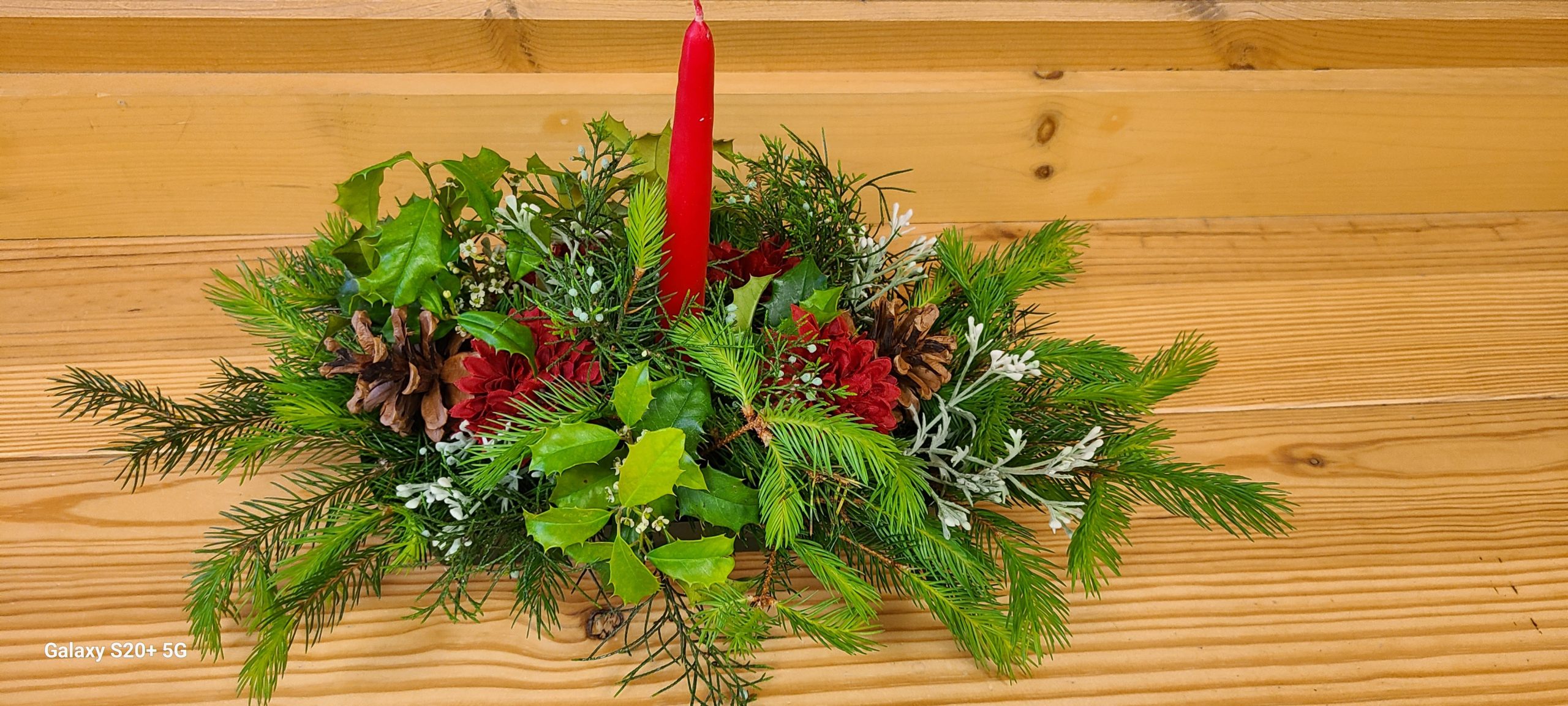 Holiday centerpiece on a wooden table